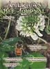 Cover photo on American Bee Journal, July 2006. A bee foraging on a Dutch white clover.
